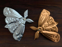 Moth Embossed Talisman