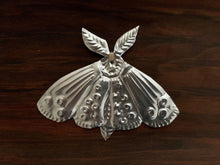 Moth Embossed Talisman