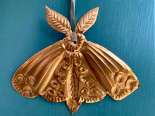 Moth Embossed Talisman