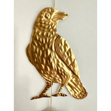 Embossed Gold Tin Crow and Mushrooms Hanging Talisman