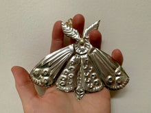Moth Embossed Talisman