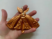 Moth Embossed Talisman